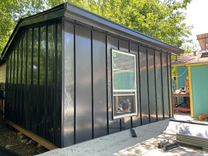 Black standing seam metal wall panels for Roof Inspection in Mooresville